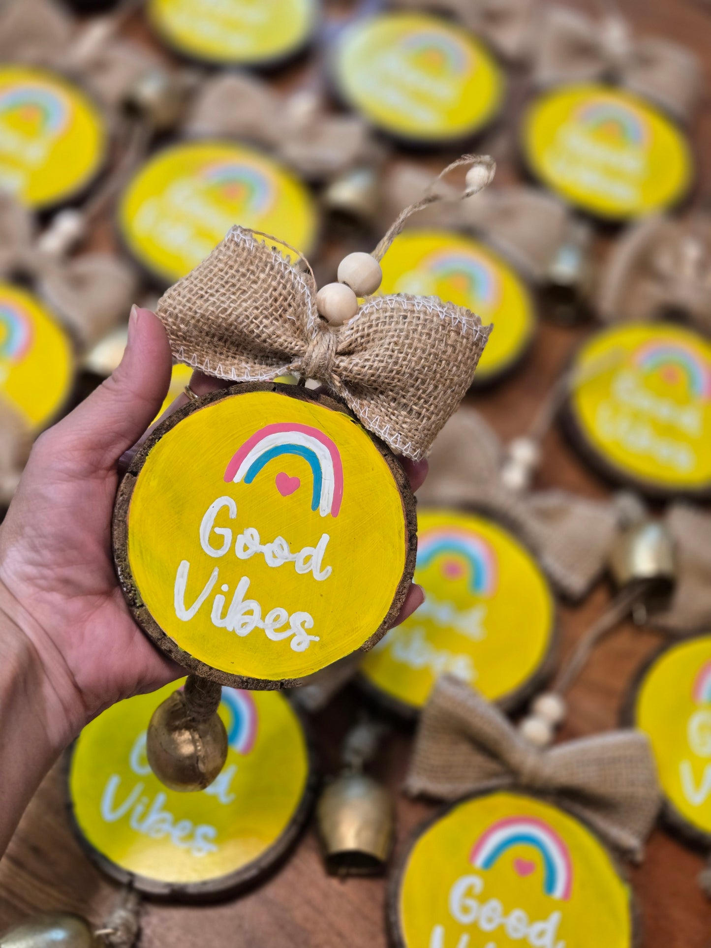 Good Vibes wall hanging with bell
