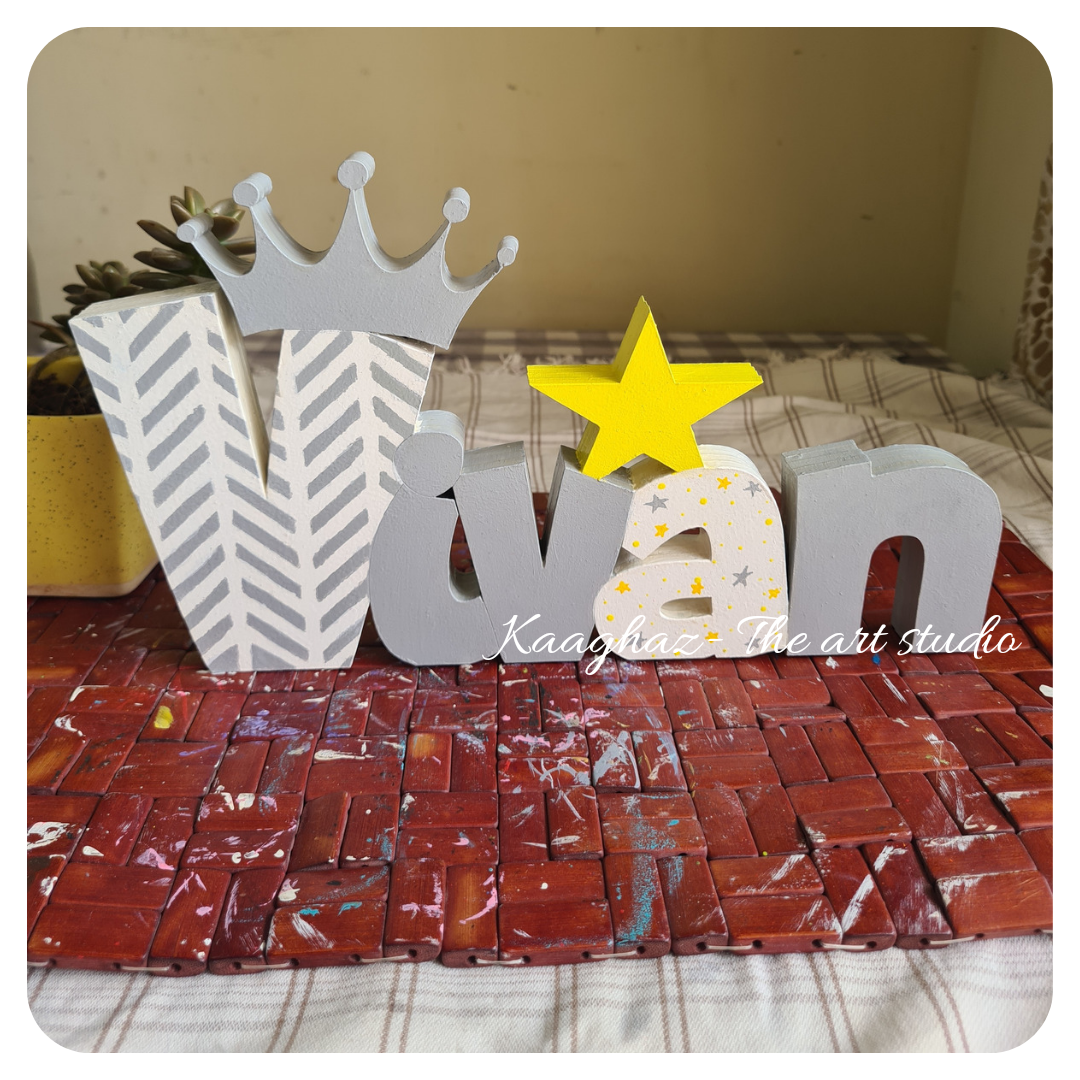 Free standing name sign with crown & star