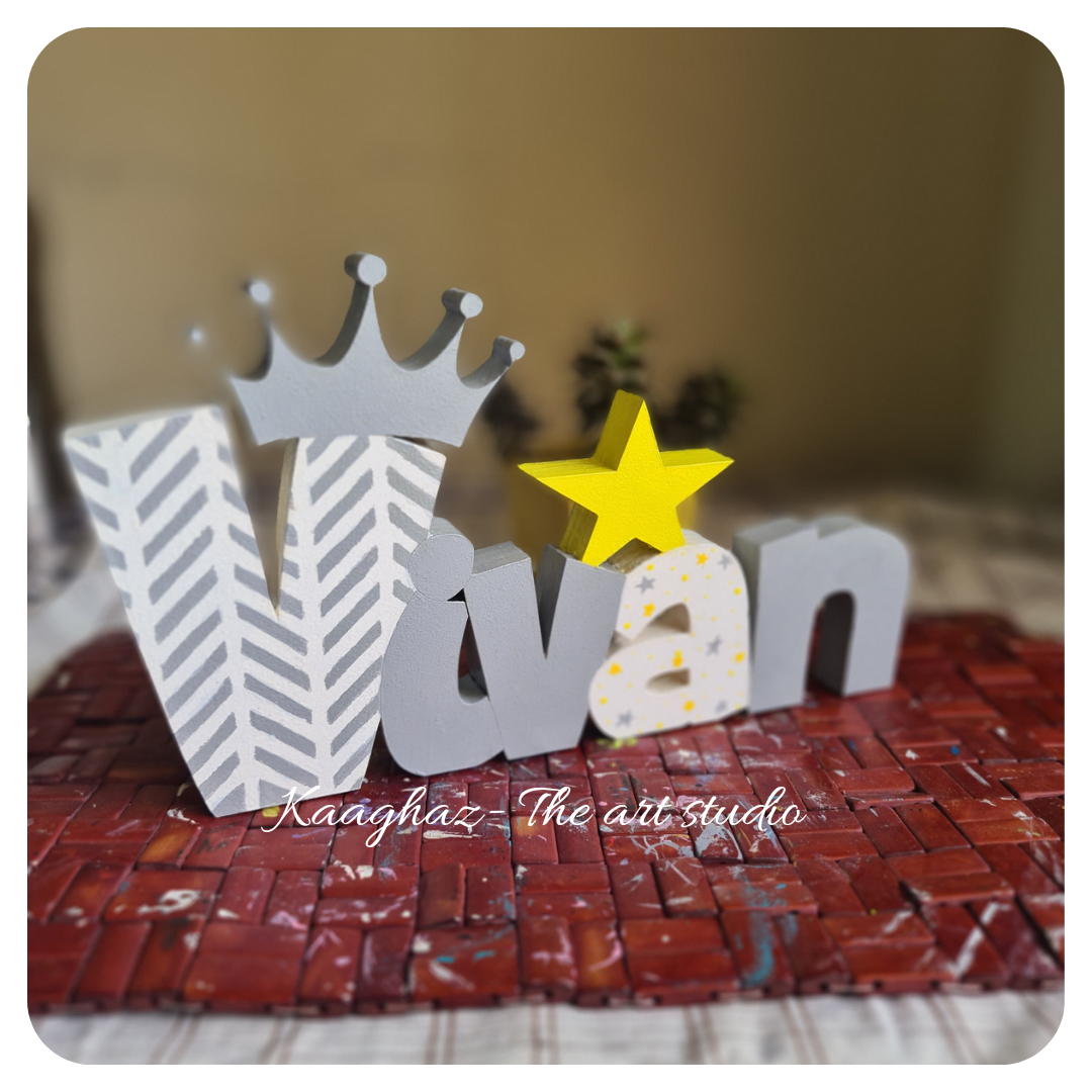 Free standing name sign with crown & star